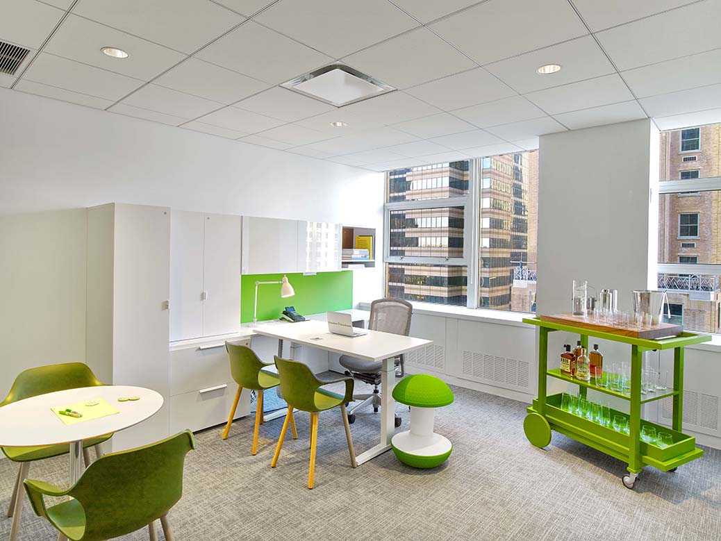 Green cheeky apple themed interior design for teacher's office