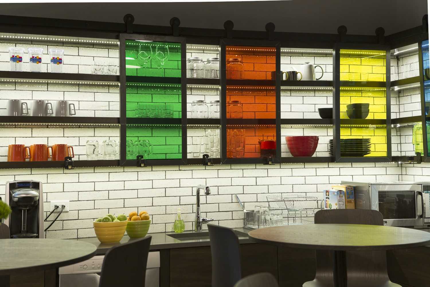 colorful break room with glass cabinets