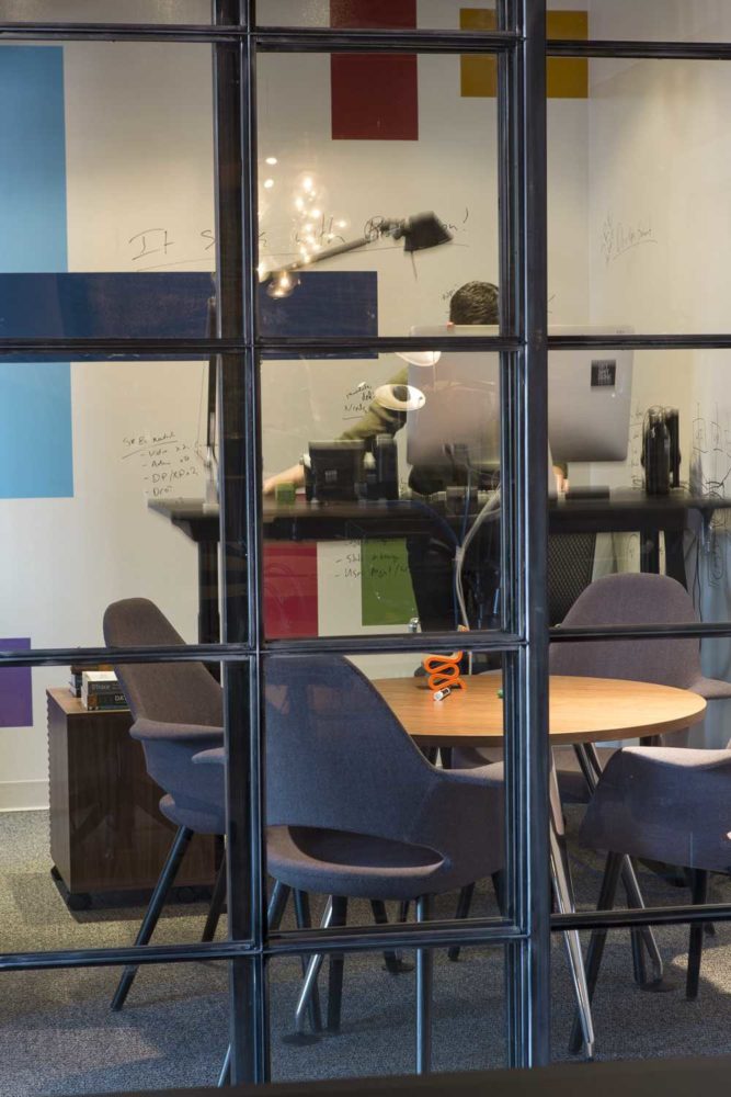 colorful conference room with steel doors