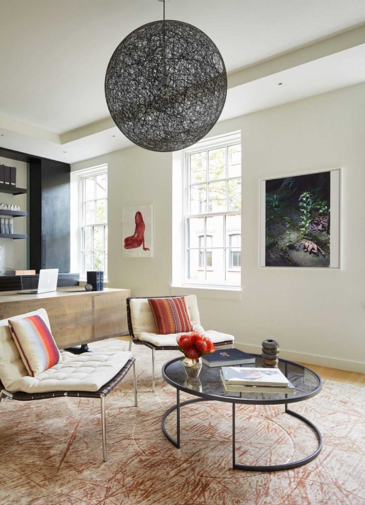 Modern And Contemporary Home Office With Seating Area And Modern Black Chandelier